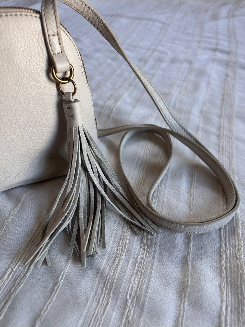 HOBO Ivory Nash Crossbody Bag | Pebbled Leather Tassel Gold Hardware - Picture 13 of 16